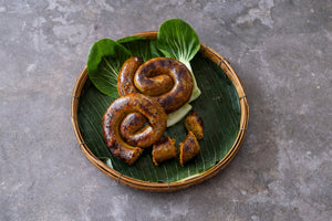 Gegrillte Sai Ua auf Bananenblatt - Yak Thai