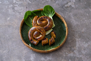 Sai Ua vom Grill – Nordthailändische Grillwurst mit Klebreis - Yak Thai